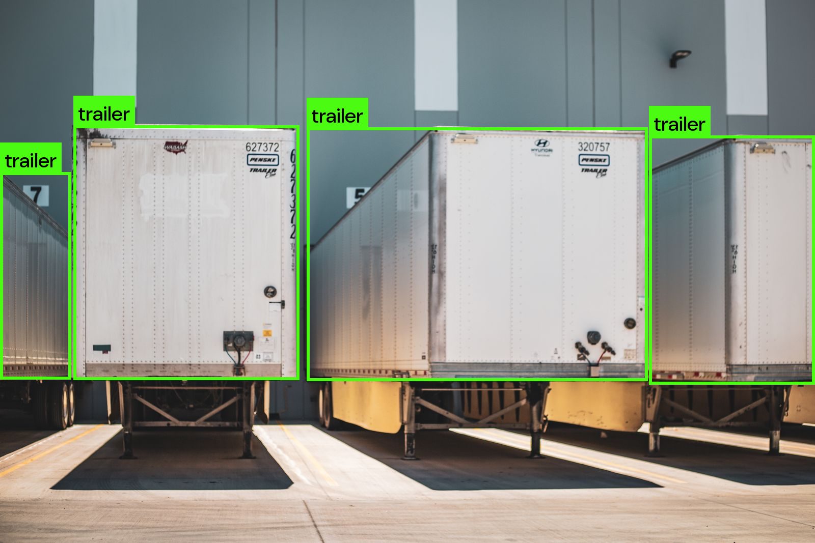 Trailers at a dock with vehicle detections